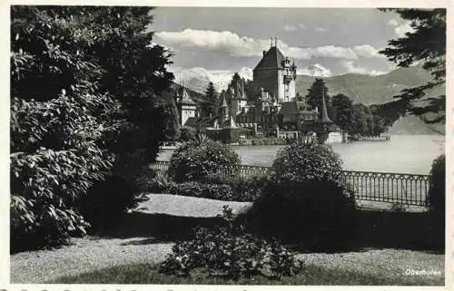 AK / Ansichtskarte  Oberhofen_Thunersee Uferpartie am See Blick zum Schloss