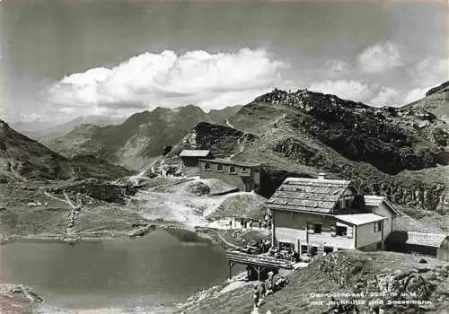 AK / Ansichtskarte  Jochpass_2207m_NW mit Jochhuette und Sesselbahn Bergsee Alpenpanorama