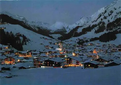 AK / Ansichtskarte 73969380 Lech_Vorarlberg_AT Panorama Wintersportplatz mit Lechtaler Alpen Nachtaufnahme