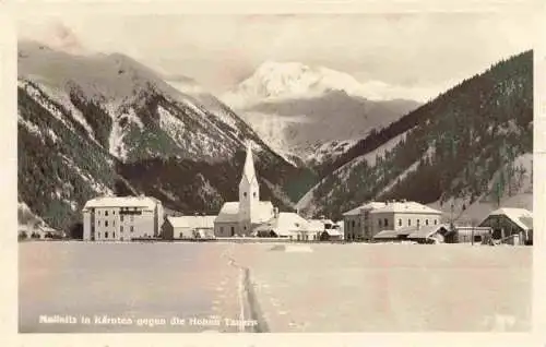 AK / Ansichtskarte 73969634 Mallnitz_Tauernbahn_Kaernten_AT Ortsansicht mit Kirche Blick gegen Hohe Tauern