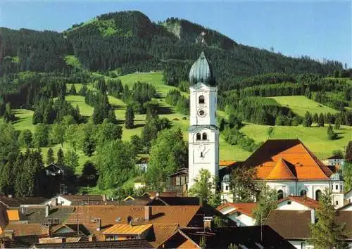 AK / Ansichtskarte  Nesselwang_Allgaeu_Bayern mit Kirche und Alpspitze