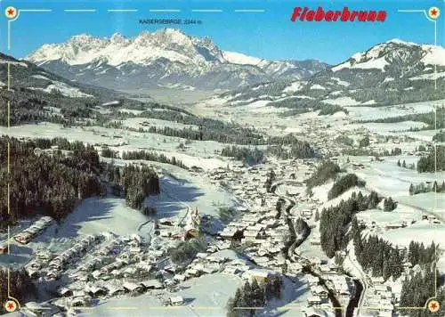 AK / Ansichtskarte 73978423 Fieberbrunn_Tirol_AT Winterpanorama Blick gegen Kaisergebirge