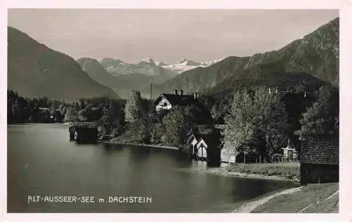 AK / Ansichtskarte 73981805 Alt-Aussee_Altaussee_Steiermark_AT Haeuserpartie am Wasser Blick zum Dachstein