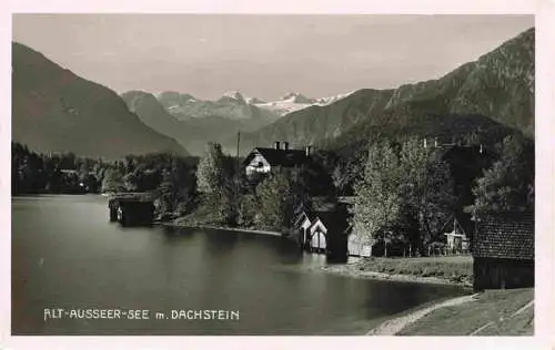 AK / Ansichtskarte  Alt-Aussee_Altaussee_Steiermark_AT Haeuserpartie am Wasser Blick zum Dachstein