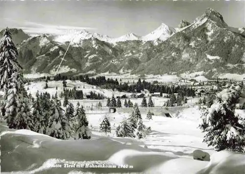 AK / Ansichtskarte  Reutte_Tirol_AT Winterpanorama mit Blick zum Hahnenkamm