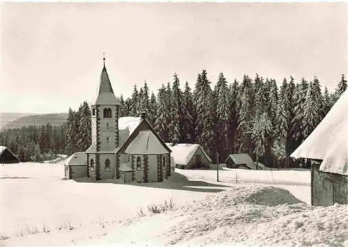 AK / Ansichtskarte 73984215 Kniebis_Freudenstadt Winterpanorama mit Kirche