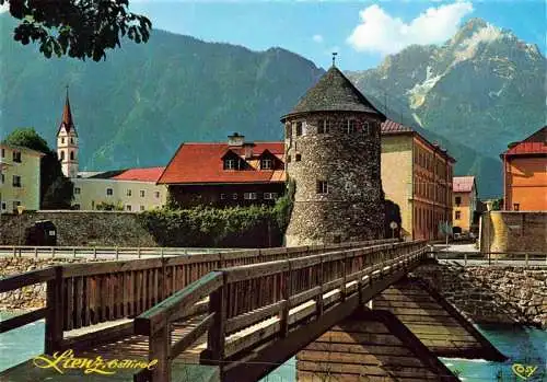 AK / Ansichtskarte 73984548 Lienz__Tirol_AT Isel Bruecke mit altem Wehrturm der Stadtmauer Franziskaner Klosterpfarrkirche und Spitzkogel