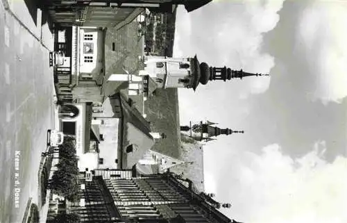 AK / Ansichtskarte 73986318 Krems_Donau_Niederoesterreich_AT Strassenpartie mit Kirche