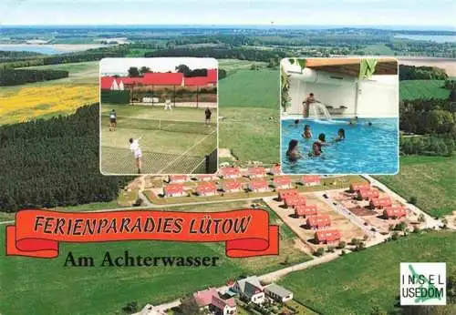 AK / Ansichtskarte 73986454 Luetow Ferienparadies am Achterwasser Ferienhaeuser Luftaufnahme Tennisplatz Hallenbad