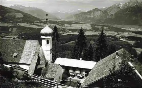 AK / Ansichtskarte  Heiligwasser_Igls_Tirol_AT Kirche mit Blick zur Zugspitze