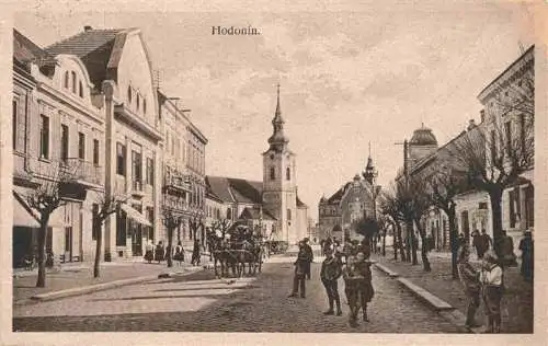 AK / Ansichtskarte  Hodonin_Goeding_CZ Strassenpartie Kirche Pferdefuhrwerk