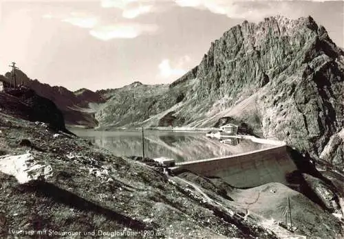 AK / Ansichtskarte  Luenersee_1969m_Vorarlberg_AT mit Staumauer und Douglashuette