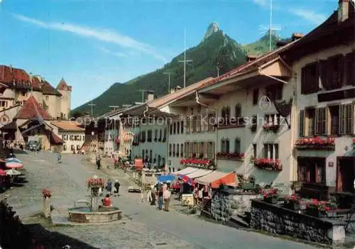 AK / Ansichtskarte  Gruyere_Gruyeres_FR Rue principale et le chateau