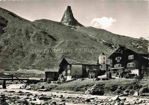 AK / Ansichtskarte Zervreila_2898m_Zervreilahorn_Olivone_GR Bergsiedlung mit Kirche Blick gegen Zerveilerhorn 