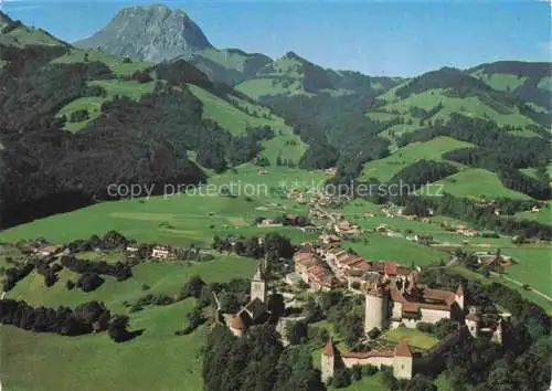 AK / Ansichtskarte Gruyeres__Gruyere_Greyerz_FR Vue aerienne son chateau et le Moleson 