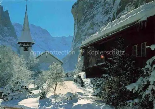 AK / Ansichtskarte  Lauterbrunnen BE Ortspartie Blick zur Kirche im Winterzauber