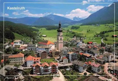 AK / Ansichtskarte  Kastelruth Castelrotto Salten Schlern Suedtirol IT Ortsansicht mit Kirche Blick gegen die Geislern