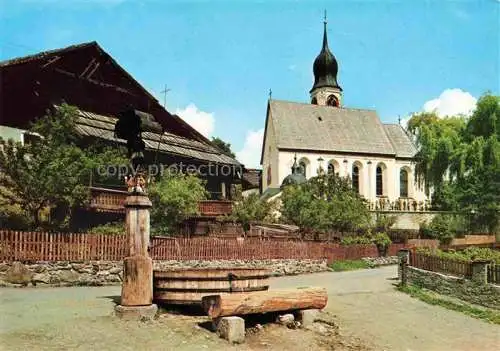 AK / Ansichtskarte  Fiss Tirol AT Ortsmotiv mit Kirche Brunnen