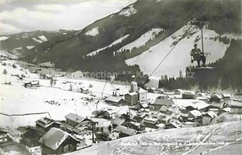 AK / Ansichtskarte  Saalbach ZELL AM SEE Pinzgau-Pongau AT Winterpanorama Bernkogellift Blick gegen Schmittenhoehe