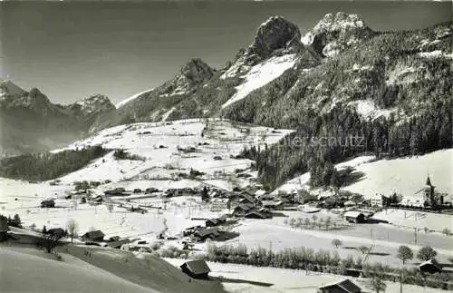 AK / Ansichtskarte  Boltigen Winterpanorama Blick gegen Mittagfluh und Holzerhorn