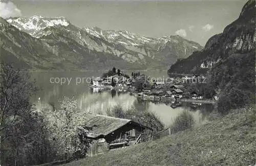 AK / Ansichtskarte  Iseltwald Interlaken BE Panorama Ort am Brienzersee Brienzerrothorn-Kette Berner Alpen