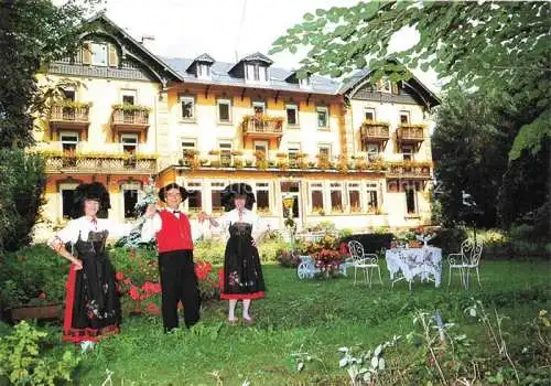 AK / Ansichtskarte  Muenster  Elsass Munster 68 Alsace Haut-Rhin Centre de Vacances Grand Hôtel et Hôtel du Parc Costumes Alsaciens