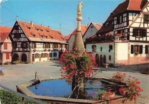 AK / Ansichtskarte  Dambach-la-Ville 67 Bas-Rhin Place du Marché Fontaine vieilles maisons alsaciennes