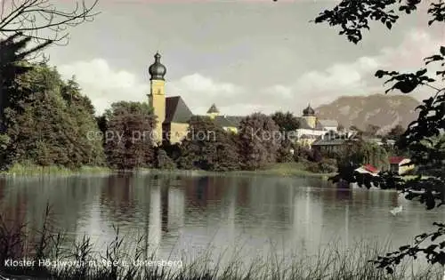 AK / Ansichtskarte  Hoeglwoerth Anger Bayern Uferpartie am See Blick zum Kloster und Untersberg