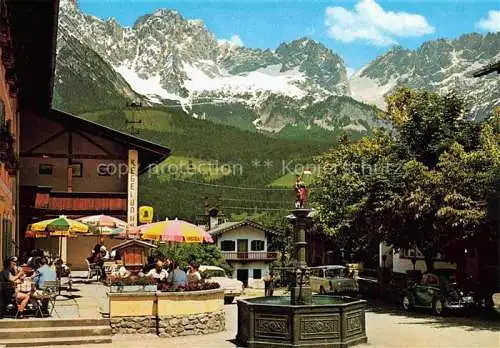 AK / Ansichtskarte  Ellmau Elmau Tirol AT Florianbrunnen im Hintergrund Wilder Kaiser Kaisergebirge