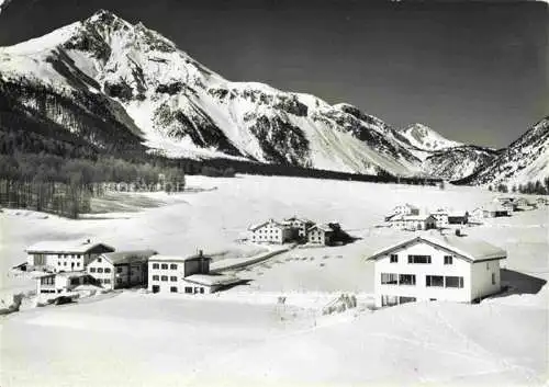 AK / Ansichtskarte  Tschierv Tschierf GR Gasthaus Sternen und Schulhaus mit Piz d'Aint und Olenpass