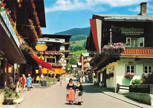 AK / Ansichtskarte  Saalbach ZELL AM SEE Pinzgau-Pongau AT Dorfstrasse Trachten Pension