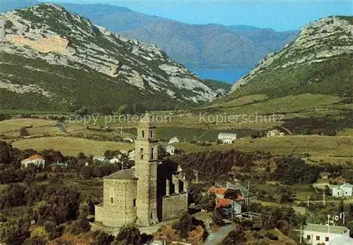 AK / Ansichtskarte  Patrimonio Eglise Saint Martin Clocher du XVIe siècle Golfe de Saint-Florent vue aérienne