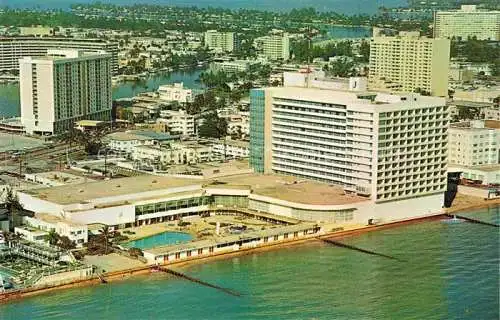 AK / Ansichtskarte  Miami Beach Deauville Hotel on Collins Avenue Atlantic Ocean aerial view