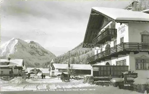 AK / Ansichtskarte  Leutasch Tirol AT Hotel Weisses Roessl im Winter Blick gegen Hohe Munde