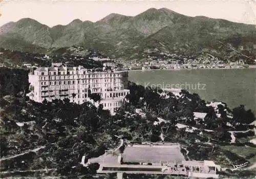 AK / Ansichtskarte  Le Cap Martin Roquebrune-Cap-Martin 06 Grand Hôtel dans le fond Menton vue aérienne