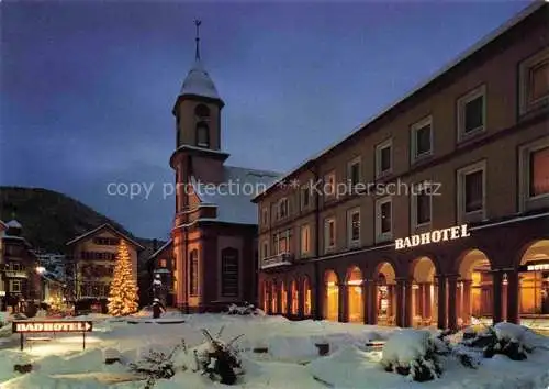 AK / Ansichtskarte  WILDBAD  Schwarzwald Badhotel Kirche Nachtaufnahme zur Weihnachtszeit