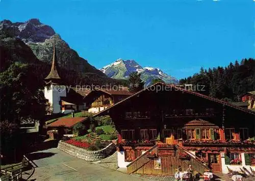 AK / Ansichtskarte  Gsteig Saanen BE Ortsmotiv mit Kirche Blick gegen Oldenhorn Diablerets Pillon-Pass