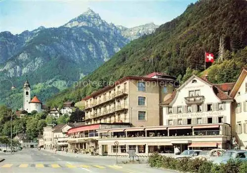 AK / Ansichtskarte  Flueelen UR Ortszentrum Hauptstrasse Blick gegen Rophaien