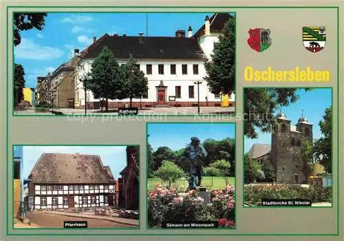 AK / Ansichtskarte  Oschersleben Bode Rathaus Pfarrhaus Saemann am Wiesenpark Statue Stadtkirche St. Nikolai