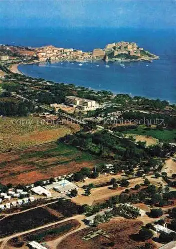 AK / Ansichtskarte  Calvi 2B Haute-Corse La Pinède longeant la plage face à la ville vue aérienne