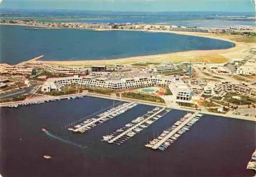 AK / Ansichtskarte  Port-Camargue 30 Gard Nouvelle station estivale en arrière plan le Grau du Roi vue aérienne