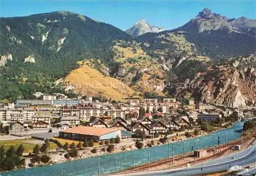 AK / Ansichtskarte  Modane 73 Savoie Panorama Quartier de l'Outraz au fond Aiguille Doran et le Rateau d'Aussois au 1er plan Arc et la piscine vue aérienne