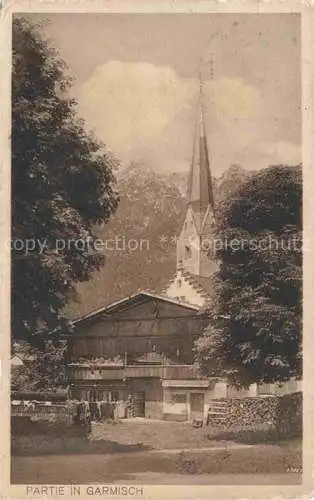 AK / Ansichtskarte  GARMISCH-PARTENKIRCHEN Ortspartie mit Kirche