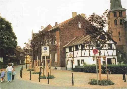 AK / Ansichtskarte  Meerbusch NRW Fussgaengerzone Ortszentrum Partie an der Kirche