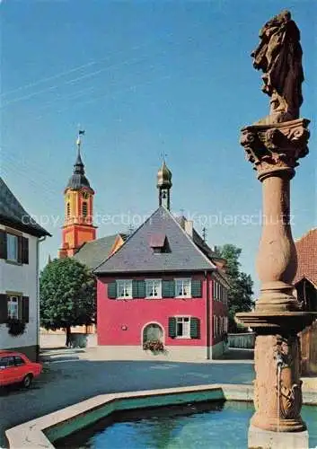 AK / Ansichtskarte Merdingen Ortszentrum Brunnen Kirchturm