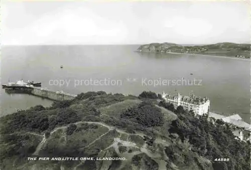 AK / Ansichtskarte Llandudno Wales UK The pier and Little Orme aerial view