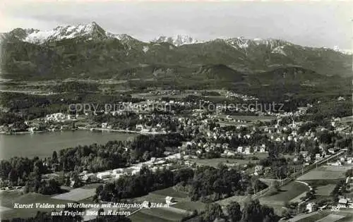 AK / Ansichtskarte Velden  Woerthersee AT mit Mittagskogel und Triglav Fliegeraufnahme