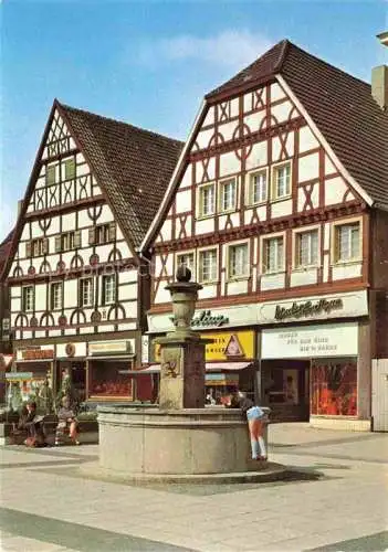 AK / Ansichtskarte Unna Alte Fachwerkhaeuser Brunnen