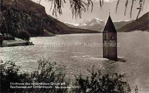 AK / Ansichtskarte Reschensee Reschen See Tirol Bolzano IT Kirchturm des versunkenen Graun mit Ortlermassiv