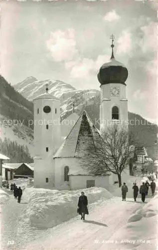 AK / Ansichtskarte St Anton Arlberg Tirol AT Ortsmotiv mit Kirche im Winter